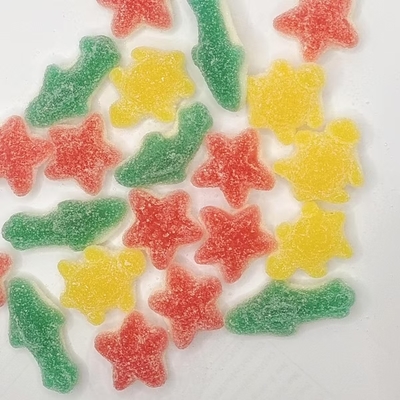Kolorowe żelki w kształtach, różne smaki owocowe, zabawne przekąski